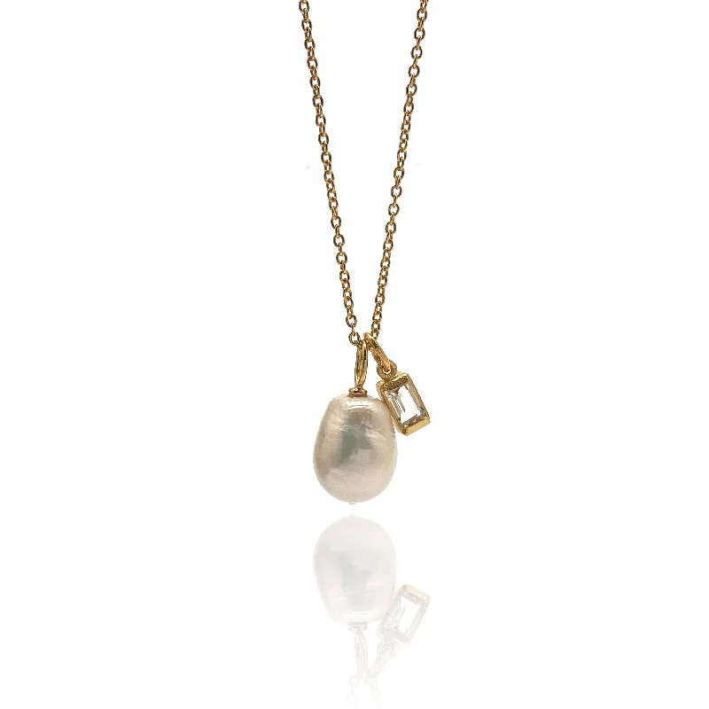 Necklaces and pendants with star-shaped designs for a whimsical, celestial touch-Pearl and White Topaz Necklace